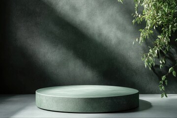 Poster - A modern design concept featuring a round concrete table surrounded by a lush green plant