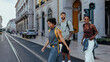 © bernardbodo - Tourists walking and crossing street in lisbon city center