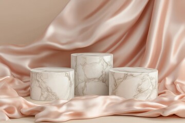 Poster - Elegant marble display stands on soft silk fabric in a well-lit setting for product showcase or artistic presentation