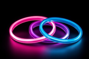 Aufkleber - Colorful glowing rings create a vibrant display against a dark background for an engaging visual effect
