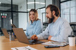 © standret - Successful, smiling and working. Man and woman are in the office together