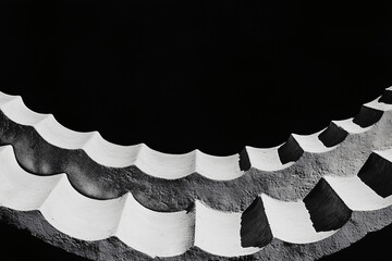 Poster - Abstract Wave Sculpture: A unique perspective of an abstract wave-like sculpture with graphic details, presented in monochrome, inviting contemplation on form and pattern.