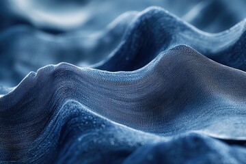Leinwandbilder - Abstract close-up of a blue fabric texture with soft waves and subtle light reflections.