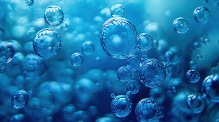 Poster - Close-up of a multitude of blue bubbles reflecting light, creating an abstract masterpiece.