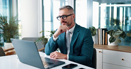 Poster - Business man, thinking and insight on laptop for problem solving, investment idea or evaluation. Computer, mature or happy corporate manager reading financial email for decision or planning in office