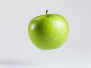 Aufkleber - Floating Green Apple Against White Background
