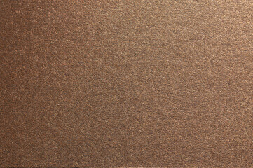 Fototapete - Elegant paper background with a smooth, grainy texture and a pearlescent finish. Warm gold and bronze tones create a luxurious, chic design with reflective shimmer and subtle shadows, perfect as a.