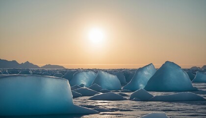 Wall Mural - sunlit arctic scene features numerous blue-tinted icebergs resting on a calm sea surface, with a haz