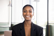 © fizkes - Head shot portrait successful professional employee, businesslady dressed in elegant black jacket laughs, look at camera, take part in videoconference, business call, webcam view. Communication, apps
