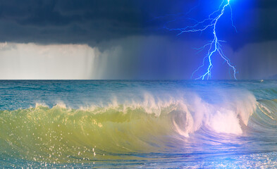 Fototapete - Amazing sunset over the stormy sea thunder and lightning in the background