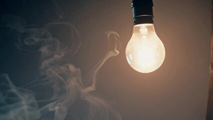 Poster - Illuminated light bulb amidst swirling smoke, warm glow. Innovation concept