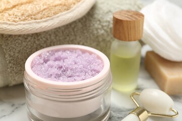 Wall Mural - different body care products on white marble table, closeup