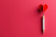 © Mongkol - Strategic targeting of goals with dart on bright pink background creative concept minimalist design perspective