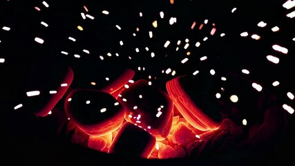 Poster - Glowing embers and sparks in the dark, burning intensity. Fire and heat concept