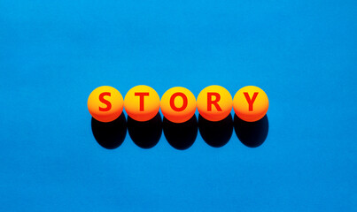 Fototapete - Story symbol. Concept word Story on beautiful yellow tennis ping pong balls. Beautiful wooden table wooden background. Business lifestyle story concept. Copy space.