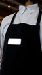 © Kevin S. - Blank Barista Mannequin Black Apron Name Tag Mockup for Cafe Restaurant Employee Worker Uniform Service Job Career