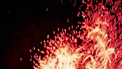 Poster - Fiery orange and red sparks flying upward in dark night. Dynamic energy concept