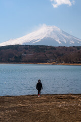 Wall Mural - happy tourist traveler woman enjoying with mount fuji in japan, spring and summer, japan travel vaca