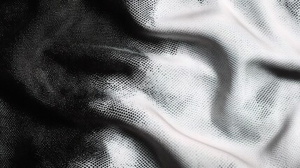 Poster - Mesh Fabric: A captivating close-up of textured mesh fabric with dynamic shadows and highlights, offering a striking visual contrast and highlighting the intricacies of its design.