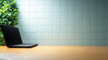 Poster - A modern laptop placed on a wooden table surrounded by natural light and a cozy atmosphere