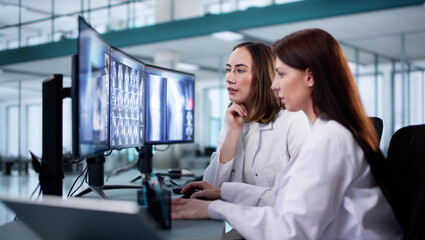 Poster - Female Dentist Examining Xray Images of Patient's Teeth