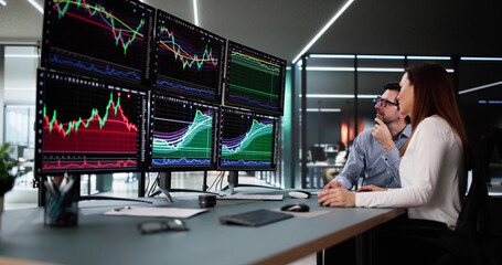 Aufkleber - Stock trader analyzing market data on multiple monitors with financial graphs