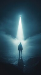 Poster - Conceptual depiction of a glowing man standing under a spotlight in a foggy landscape during nightfall
