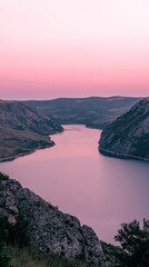 Poster - A tranquil river winds through mountains under a colorful sky