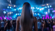© Nanotrillion - Back View of a Woman at a Vibrant Live Concert