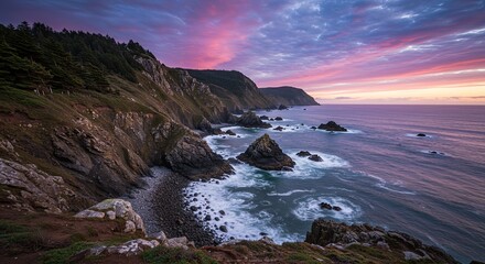 Aufkleber - A beautiful sunset over the ocean with a rocky shoreline