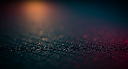 Poster - A blurry image of a dark surface with a bright light shining on it