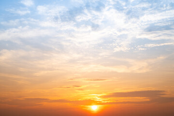 Wall Mural - beautiful , luxury soft gradient orange gold clouds and sunlight on the blue sky perfect for the bac