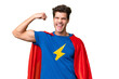 © luismolinero - Super Hero caucasian man over isolated background doing strong gesture
