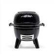 © Thanakorn - A sleek black charcoal barbecue grill set against a clear background providing ample copy space for text or graphics to illustrate summer barbecuing and outdoor cooking experiences