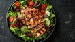 © pornpong - Vibrant salad with tender chicken and fresh vegetables arranged beautifully in a bowl for a delightful dining experience