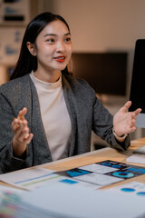 Poster - Asian businesswoman discussing marketing data in office meeting