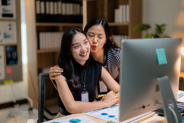 Poster - Asian businesswomen working together in office with happy emotion
