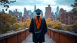 © MikeLegend - Graduate walks toward city skyline in graduation attire during dusk