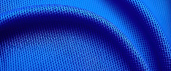 Close-up of textured blue athletic jersey fabric showing weave and subtle sheen, fitness, seamless