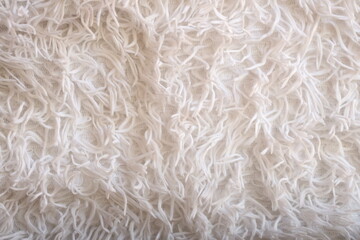 Poster - A close-up shot of a soft and fluffy white blanket.