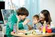 © ces - Mother and son painting together in their room