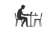 © ChristianRiyanfhi - Silhouette of Man Working in Cafe with Laptop
