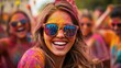 © Nattapol - Joyful celebration with colorful powder and smiles.