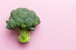 © sosiukin - Top view fresh green broccoli vegetable on Colored background. Broccoli cabbage head Healthy or vegetarian food concept. Flat lay. Copy space