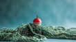 © -Quantum Pixels- - Fishing net featuring a homemade bobber against a blue backdrop. Image includes space for your text.