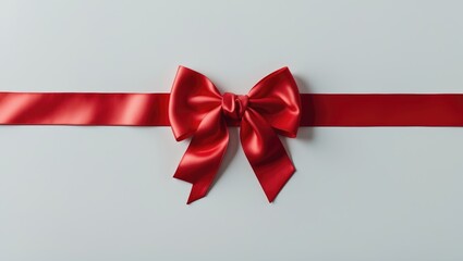 Poster - Red satin ribbon with bow on white backdrop, overhead view