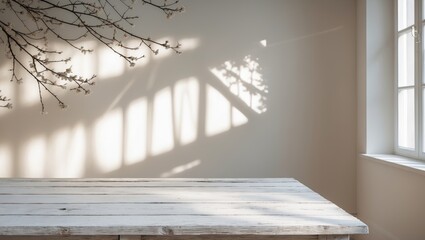 Poster - An elegant and subtle abstract light background for product presentation featuring delicate shadows created by branches on the wall. Sunlight streams through the window, illuminating an empty table.