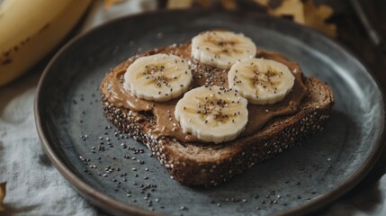 Poster - A close-up of a slice of whole grain toast topped with peanut butter and banana slices, sprinkled with chia seeds, showcasing a nutritious snack option.