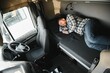 © Serhii - Truck driver sleeping in his cabin after working long routes overtime. Sleepy trucker taking a nap on a bed inside truck transporter. Lack of sleep