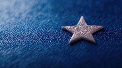 Poster - A small shining star on a blue fabric